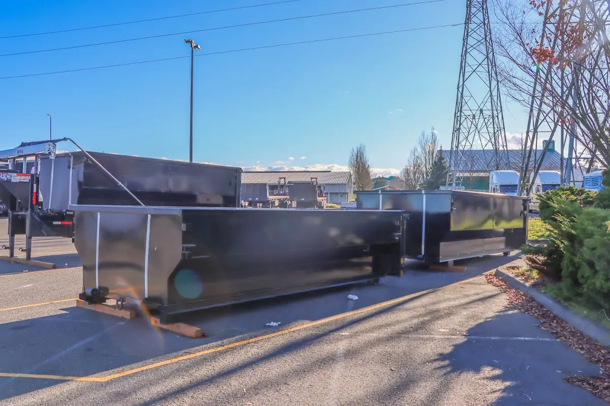 Roll-off dumpster ready for waste disposal at job site for 2 Yard Dumpster Rental in Yorktown